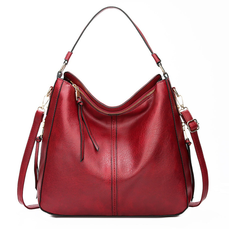 Elegant Genuine Leather Handbag – The Essence of Refinement