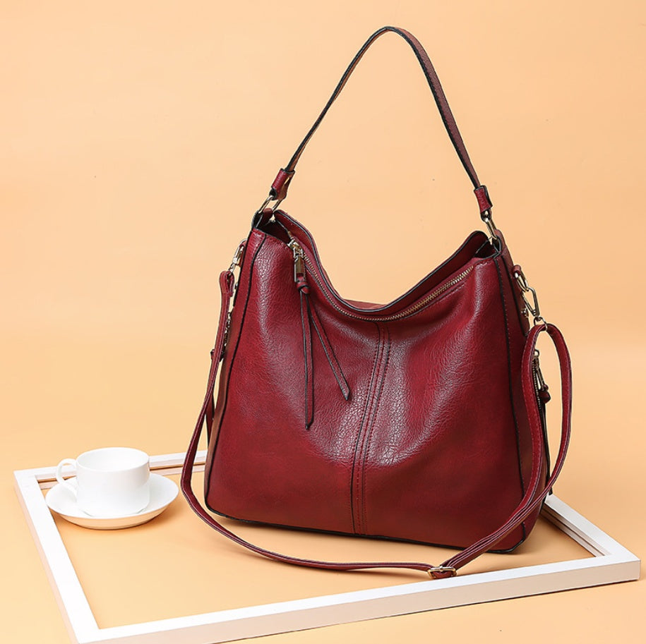Elegant Genuine Leather Handbag – The Essence of Refinement
