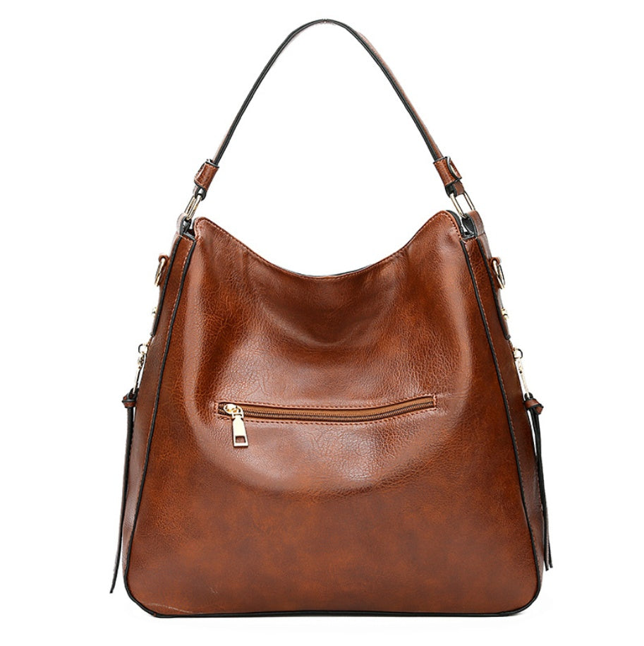 Elegant Genuine Leather Handbag – The Essence of Refinement