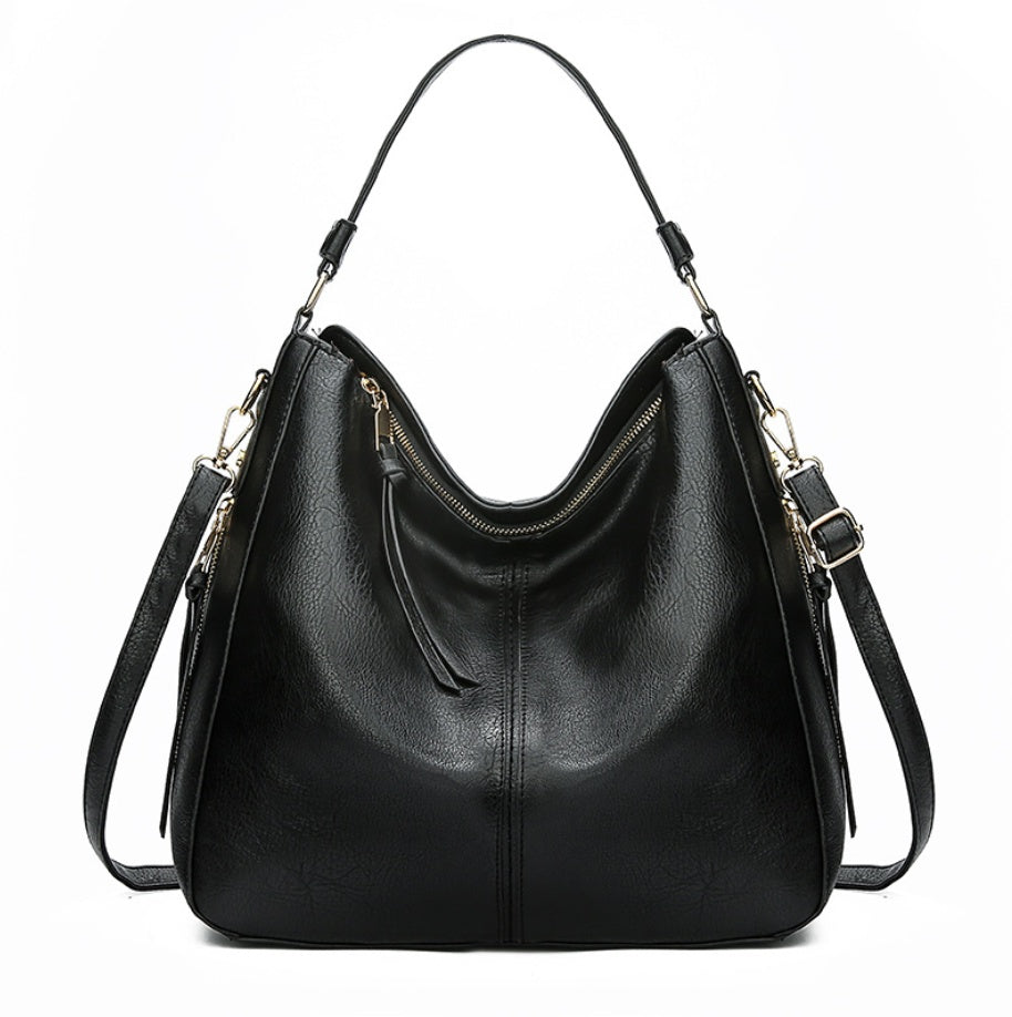 Elegant Genuine Leather Handbag – The Essence of Refinement