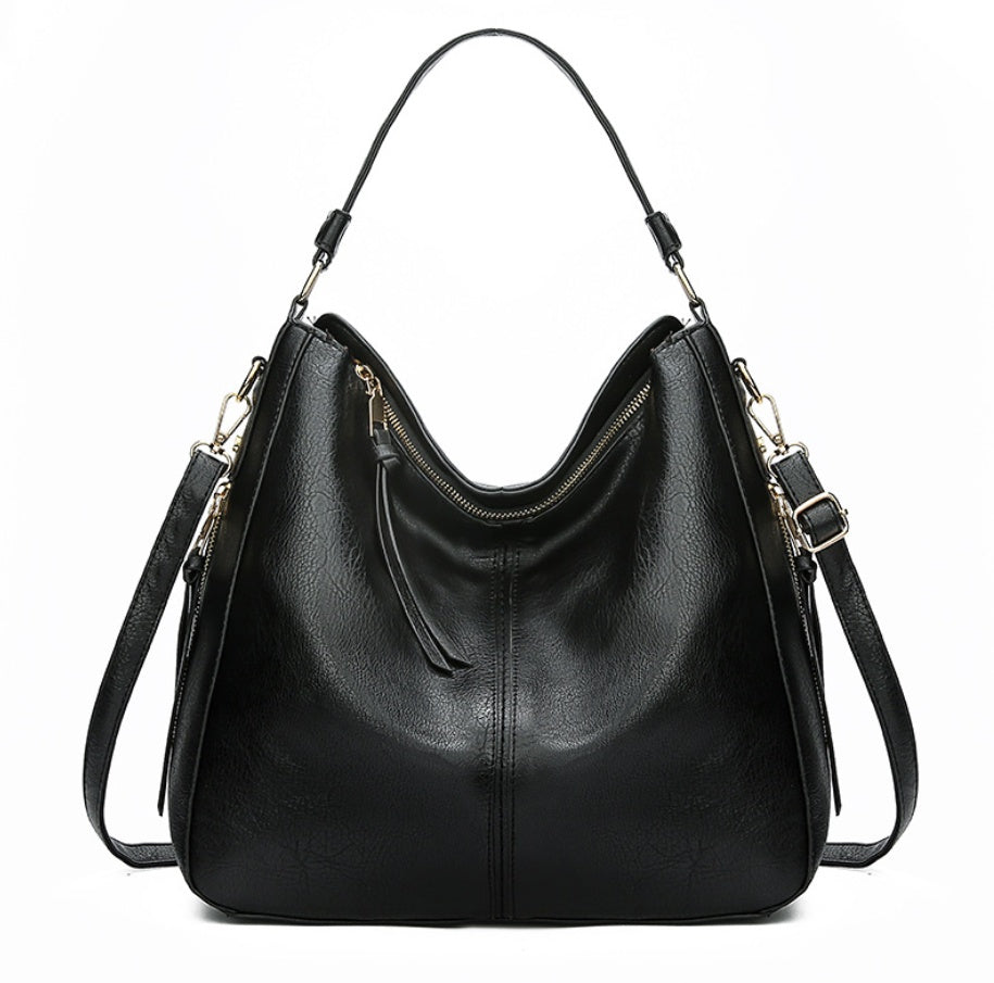 Elegant Genuine Leather Handbag – The Essence of Refinement