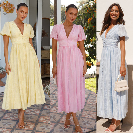Long V-neck dress with puffed sleeves