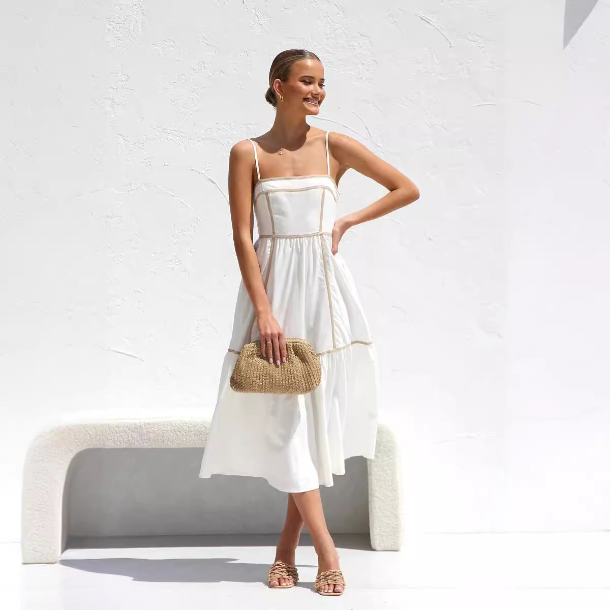Midi dress with thin straps and ruffled skirt