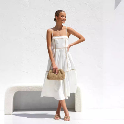 Midi dress with thin straps and ruffled skirt